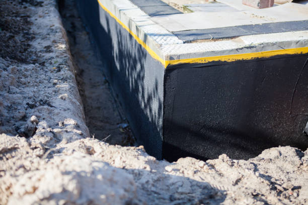 Professional Waterproofing technician working in Waverly, NY